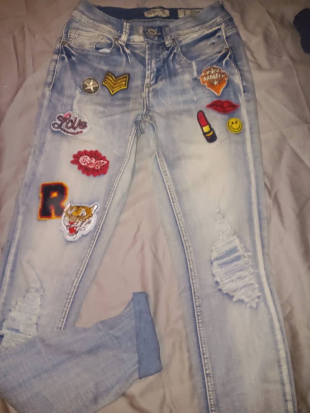 Light Wash Skinny Jeans with Embroidered Patch Accents - Women's